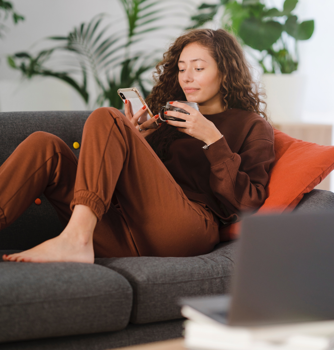 Woman on couch Image.