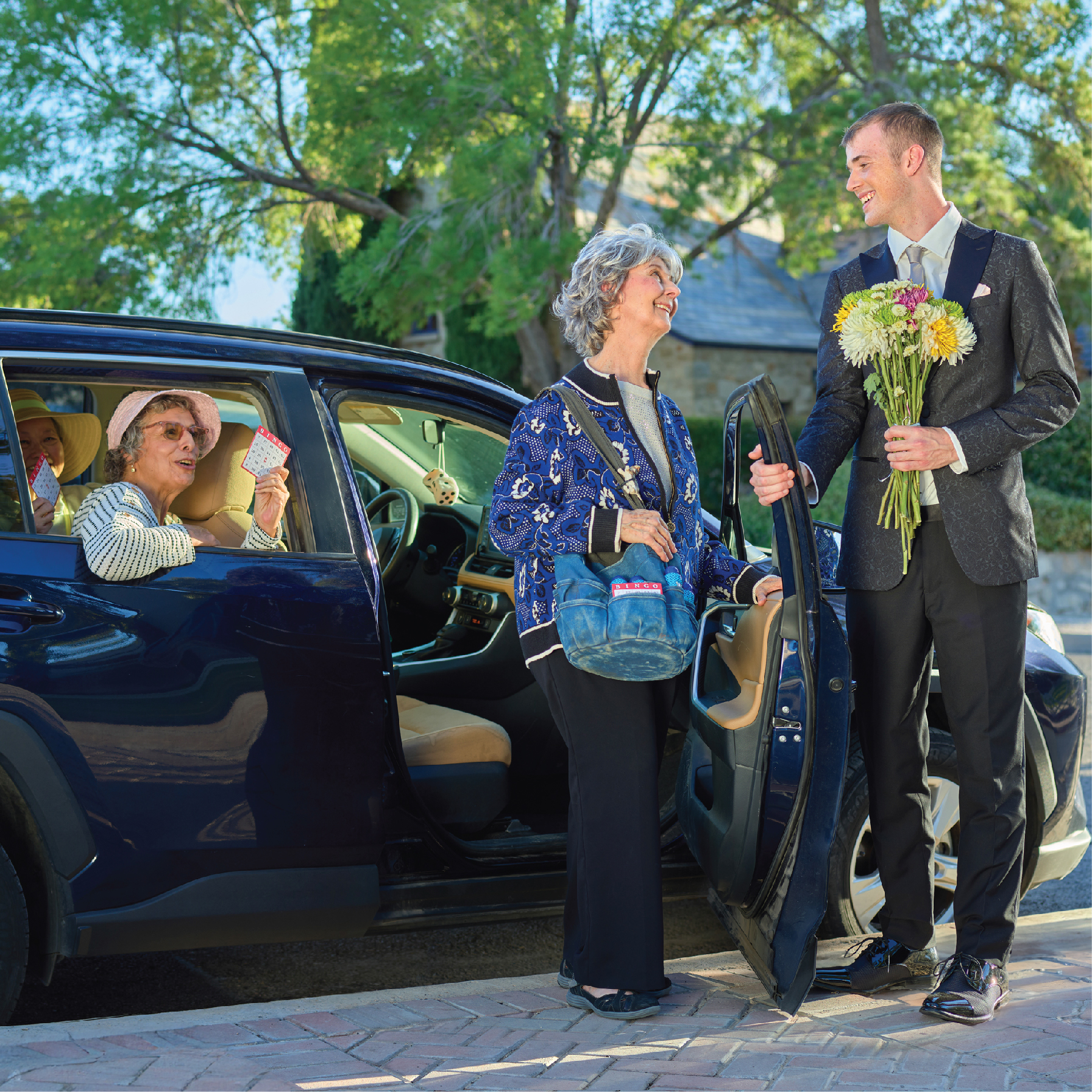 Young man arrives to pick up his grandma and her friends